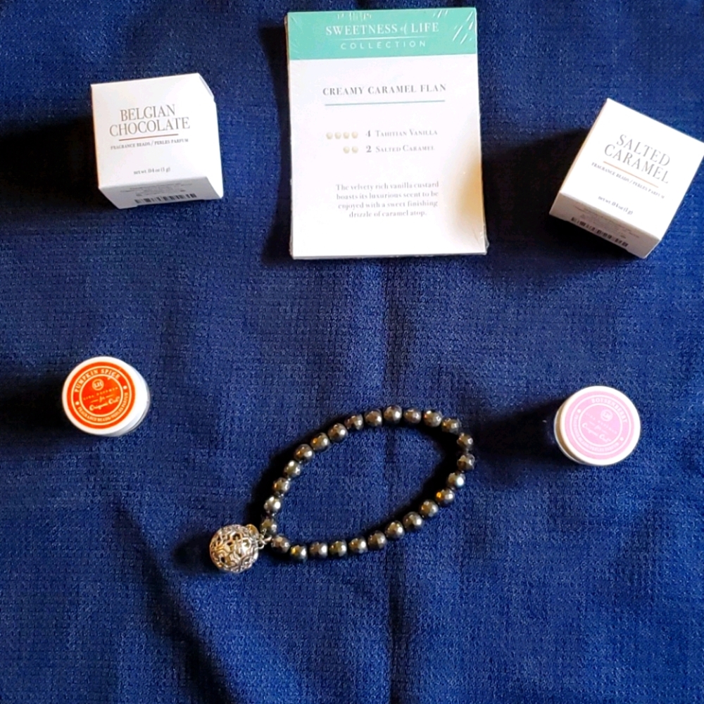 Origami bracelet with scent beads included. Great deal
